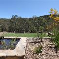 Gould League Area with a garden, pond and grassed area